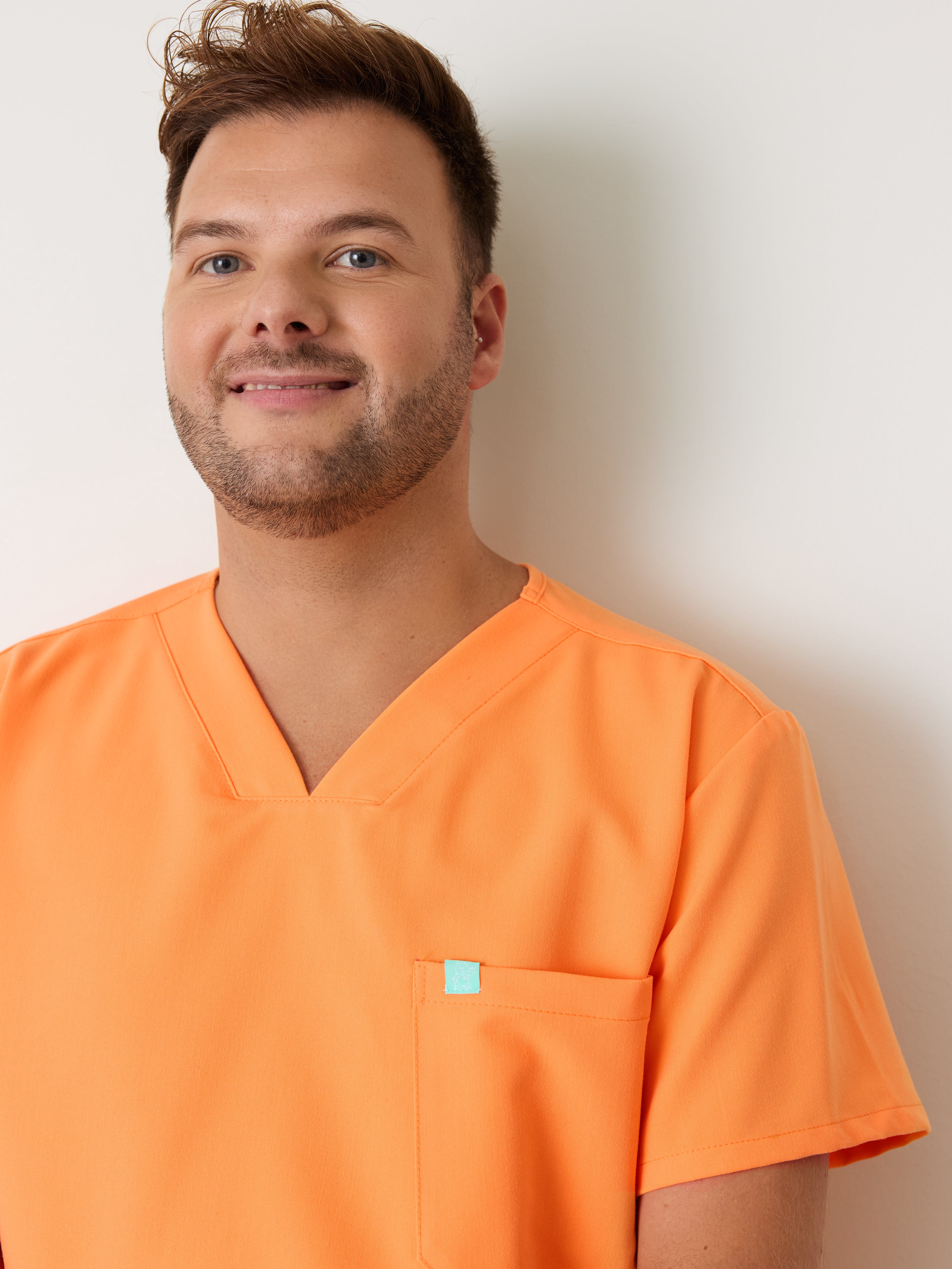 LOGAN RE-GARDE™ - NECTARINE - One Pocket Men's Scrub Top - SILVADUR™ - Final Sale