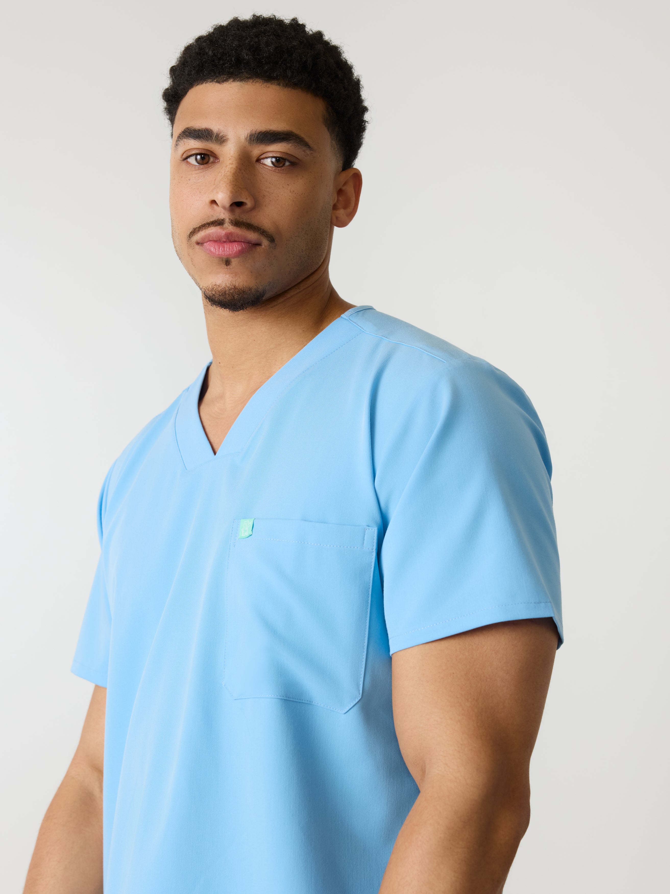 LOGAN RE-GARDE™ - CLASSIC BLUE - One Pocket Men's Scrub Top - SILVADUR™