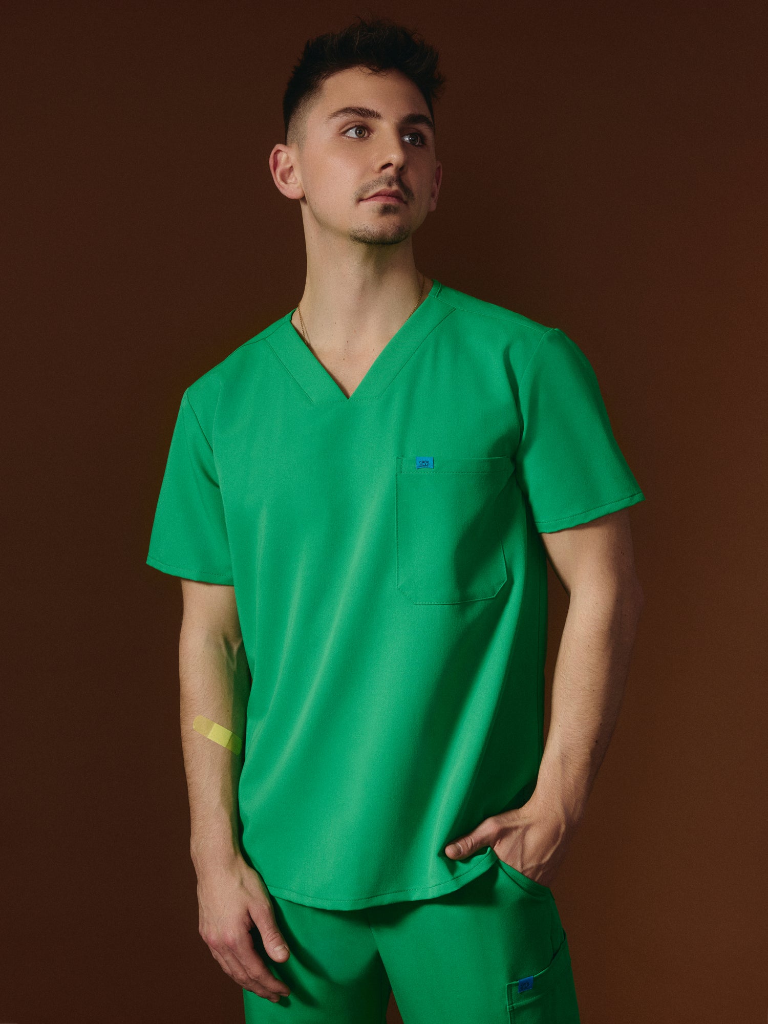 LOGAN RE-GARDE™ - G-M x PONY GREEN - One Pocket Men's Scrub Top - SILVADUR™
