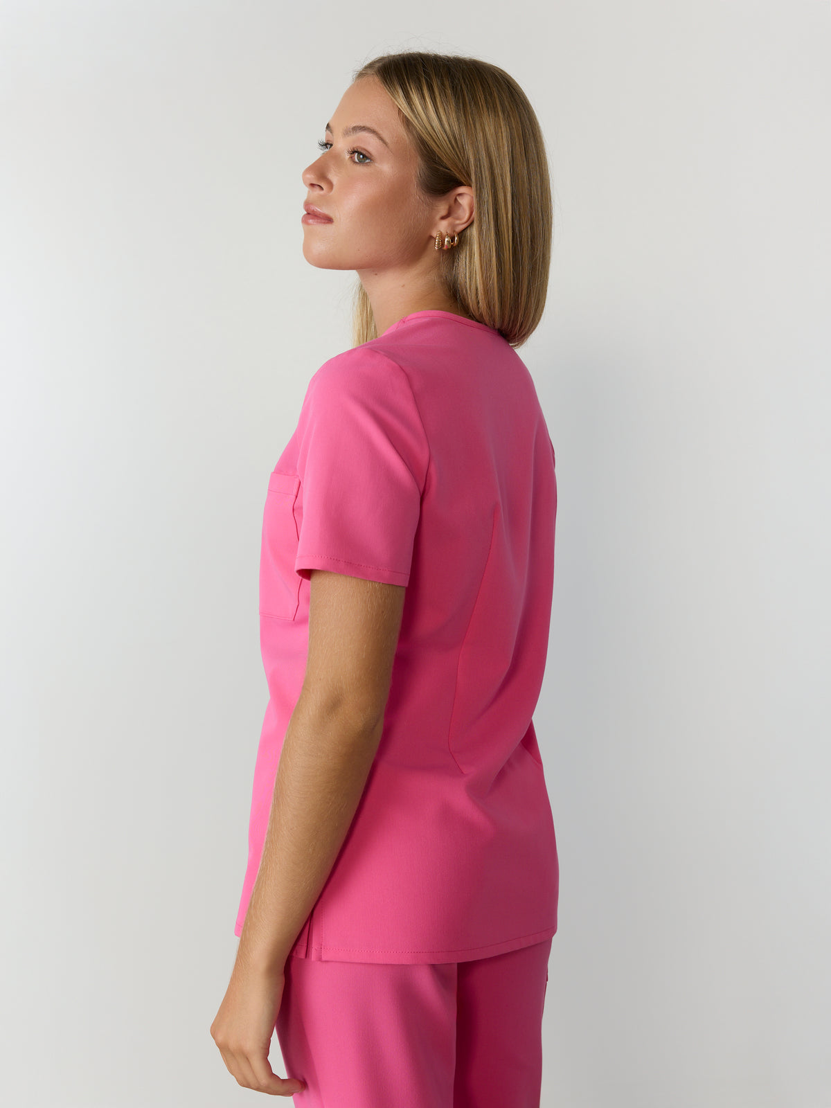 GABRIELLE RE-GARDE™ - SUNRISE PINK - One Pocket Scrub Top - SILVADUR™