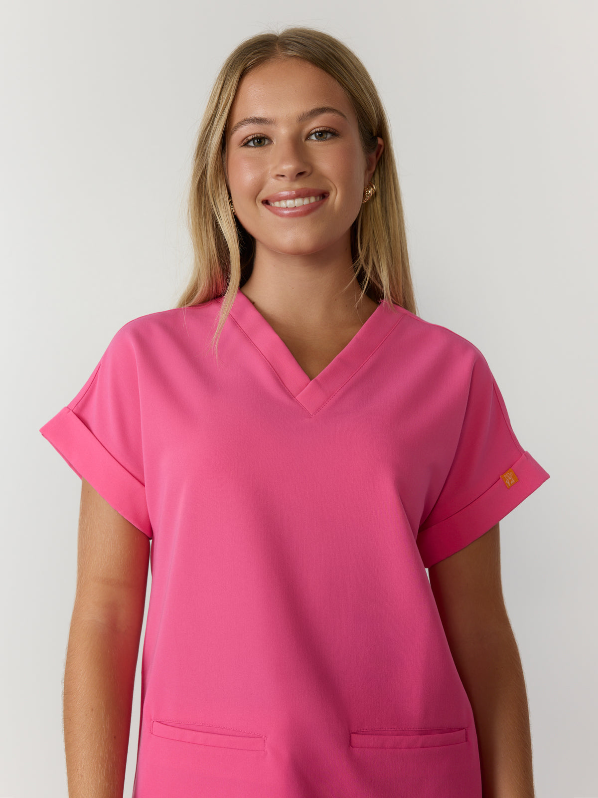 HALLI RE-GARDE™ - SUNRISE PINK - Loose Fit Scrub Top - SILVADUR™